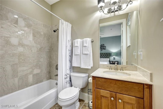 9293 Menaggio Ct Unit 102, Naples, FL 34114 - ensuite bathroom with vanity, ensuite bath, a notable chandelier, shower / bath combo with shower curtain, and toilet