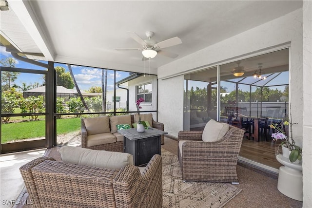 sunroom / solarium with ceiling fan