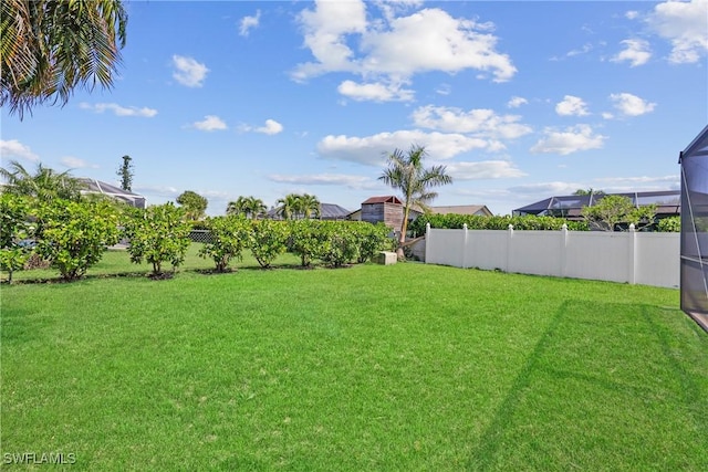 view of yard featuring fence