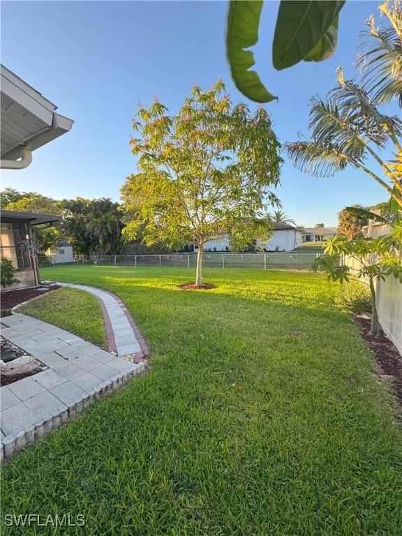 view of yard with fence