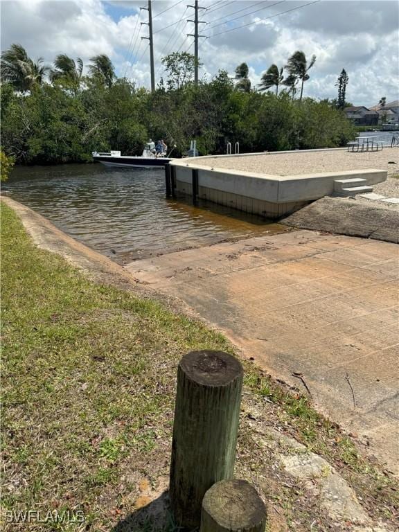 dock area featuring a water view