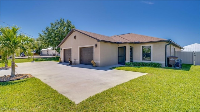 ranch-style house with stucco siding, an attached garage, fence, and a front lawn