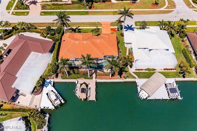 drone / aerial view with a water view