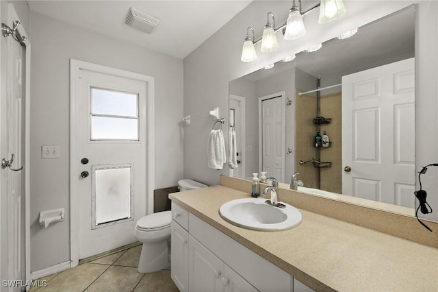 2218 NE 5th Ter, Cape Coral, FL 33909 - bathroom with visible vents, toilet, a shower, vanity, and tile patterned floors
