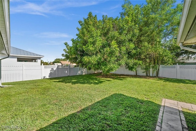 2218 NE 5th Ter, Cape Coral, FL 33909 - view of yard featuring a fenced backyard
