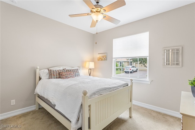 13104 Silver Thorn Loop, North Fort Myers, FL 33903 - carpeted bedroom with baseboards and ceiling fan