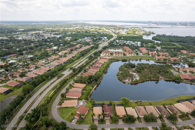 13104 Silver Thorn Loop, North Fort Myers, FL 33903 - aerial view of property and surrounding area featuring a nearby body of water and nearby suburban area