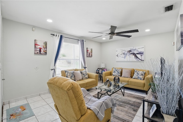 living room featuring light tile patterned flooring, visible vents, recessed lighting, and ceiling fan