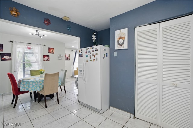 dining room featuring light tile patterned flooring