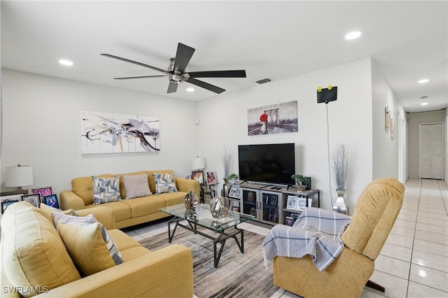 living area with a ceiling fan, light tile patterned flooring, recessed lighting, and visible vents