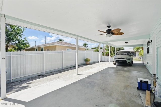 view of patio / terrace with a fenced backyard and a ceiling fan