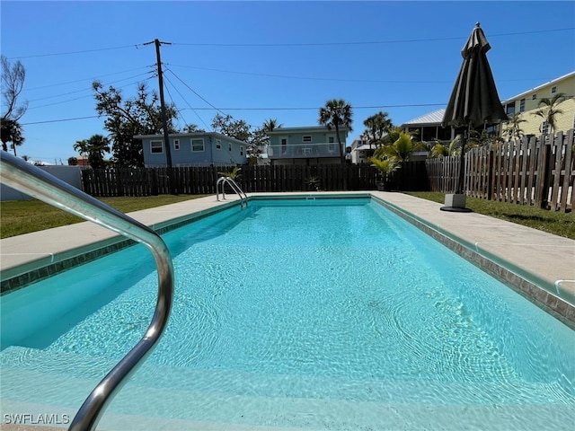 5460 Oak Ridge Ave, Fort Myers Beach, FL 33931 - view of pool featuring a fenced in pool, a fenced backyard, and a water slide