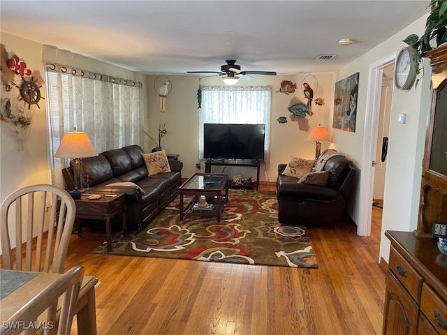 5460 Oak Ridge Ave, Fort Myers Beach, FL 33931 - living area with visible vents, wood finished floors, and ceiling fan