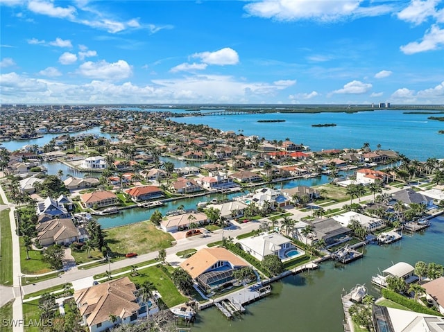 bird's eye view with a water view