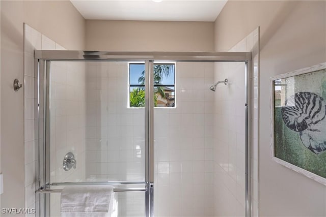 full bathroom featuring a stall shower