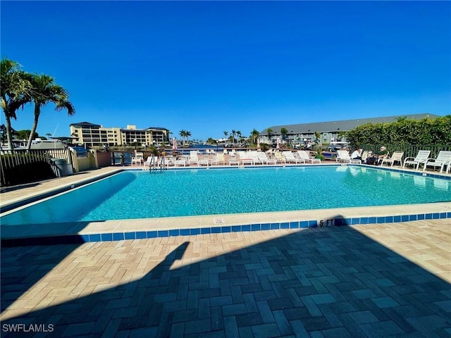 4703 SE 17th Pl Unit 105, Cape Coral, FL 33904 - community pool with a patio