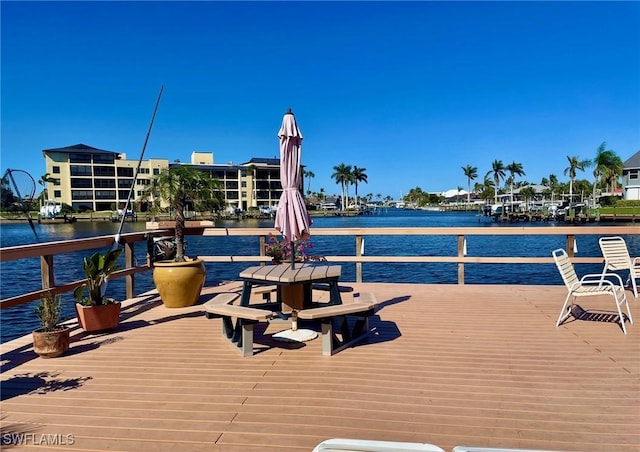 4703 SE 17th Pl Unit 105, Cape Coral, FL 33904 - dock featuring a water view