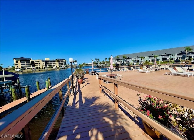 4703 SE 17th Pl Unit 105, Cape Coral, FL 33904 - dock area with a water view