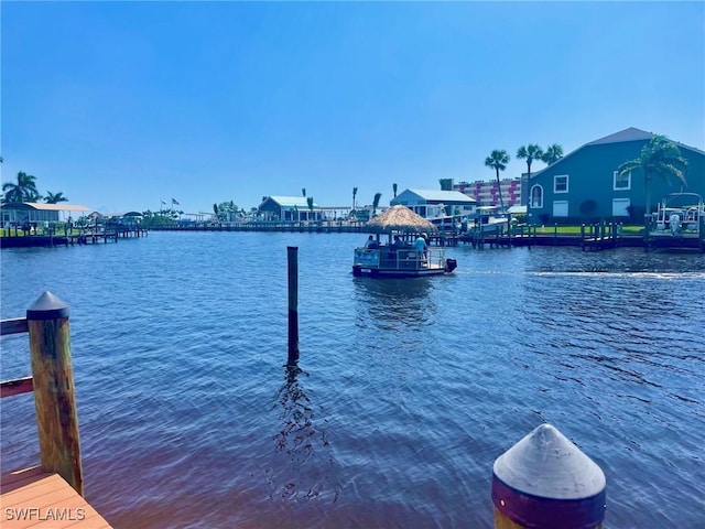4703 SE 17th Pl Unit 105, Cape Coral, FL 33904 - dock area featuring a water view