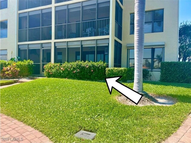 4703 SE 17th Pl Unit 105, Cape Coral, FL 33904 - view of home's community with a lawn