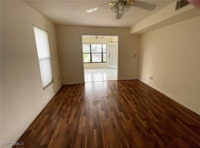 4703 SE 17th Pl Unit 105, Cape Coral, FL 33904 - unfurnished room featuring ceiling fan, wood finished floors, and baseboards