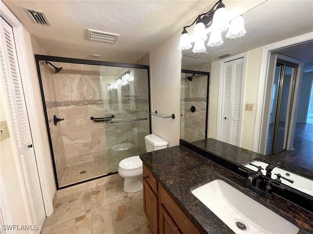4703 SE 17th Pl Unit 105, Cape Coral, FL 33904 - full bath with a closet, a shower stall, toilet, and vanity
