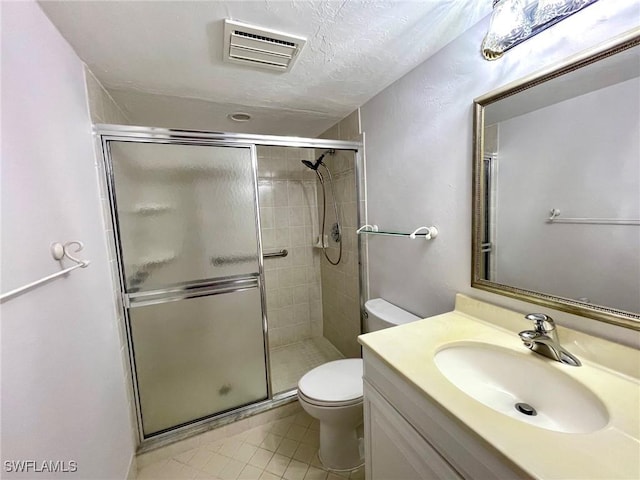 4703 SE 17th Pl Unit 105, Cape Coral, FL 33904 - full bathroom with a shower stall, toilet, vanity, and tile patterned floors