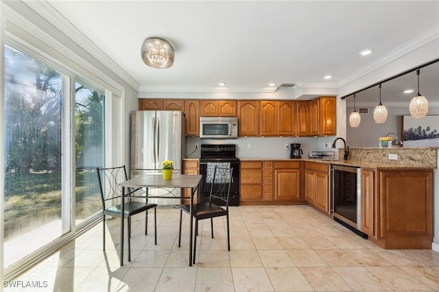 944 22nd Ave N, Naples, FL 34103 - kitchen with brown cabinets, a sink, stainless steel appliances, wine cooler, and crown molding
