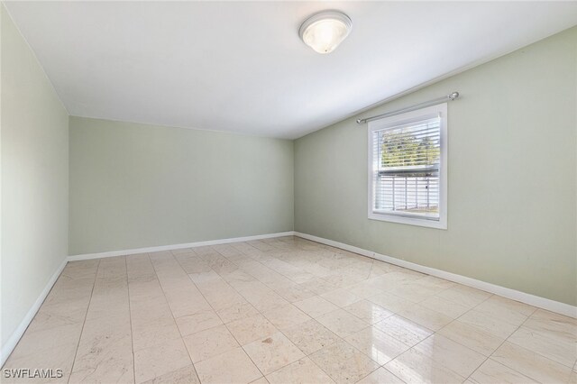 944 22nd Ave N, Naples, FL 34103 - empty room featuring baseboards