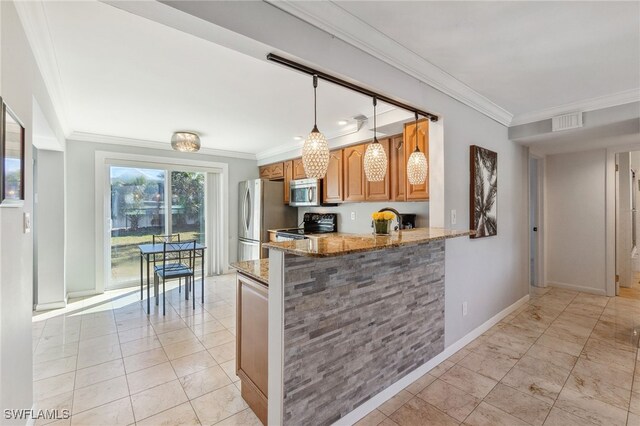 944 22nd Ave N, Naples, FL 34103 - kitchen featuring visible vents, stainless steel appliances, crown molding, and light stone countertops