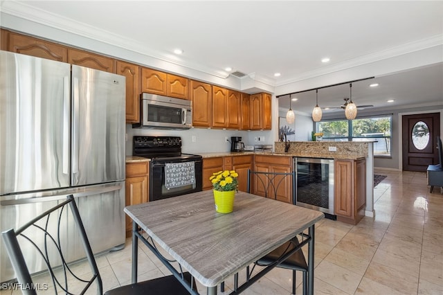 944 22nd Ave N, Naples, FL 34103 - kitchen with brown cabinets, ornamental molding, stainless steel appliances, wine cooler, and a peninsula