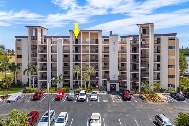 3458 Hancock Bridge Pkwy Unit 163, North Fort Myers, FL 33903 - view of property with uncovered parking