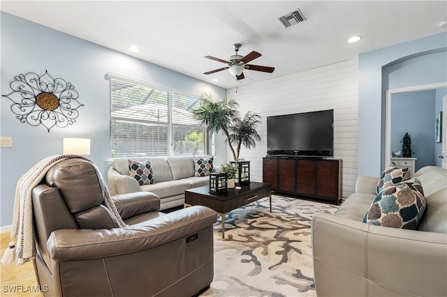 living room featuring recessed lighting, visible vents, and ceiling fan