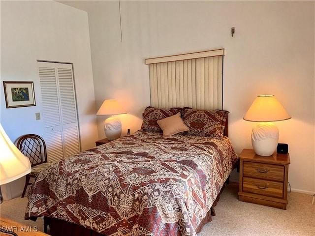 carpeted bedroom with a closet