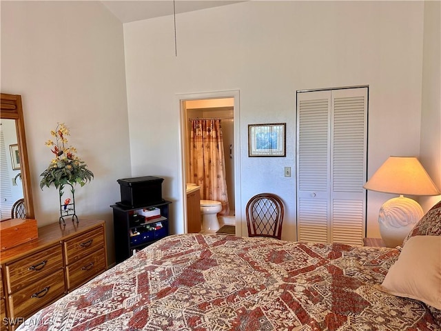 bedroom featuring a closet and ensuite bathroom