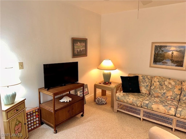 living area with light colored carpet