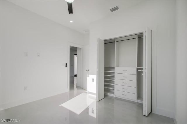 unfurnished bedroom with recessed lighting, a ceiling fan, visible vents, and a closet