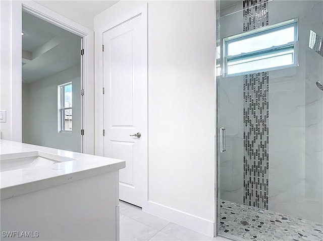 650 Kraft St, Lehigh Acres, FL 33974 - full bath featuring a shower stall, vanity, and baseboards