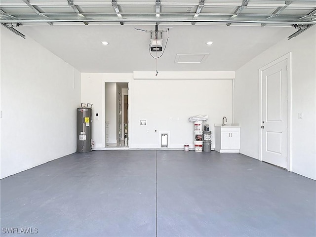 650 Kraft St, Lehigh Acres, FL 33974 - garage with electric water heater, a garage door opener, a sink, and recessed lighting
