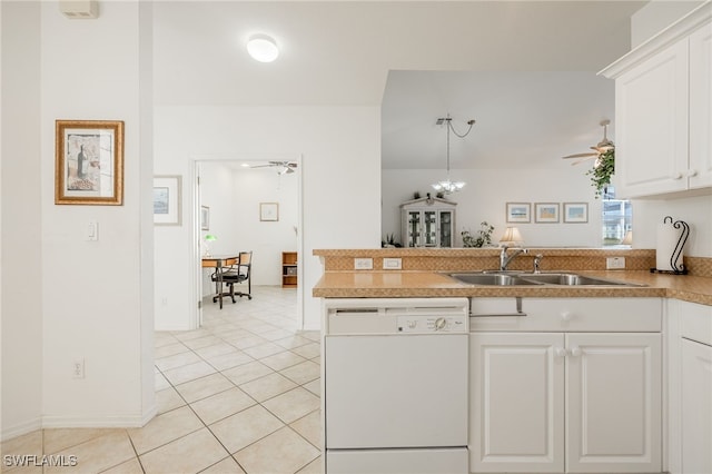 kitchen with a ceiling fan, a sink, a peninsula, white cabinets, and dishwasher