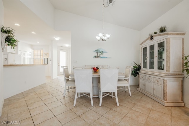 unfurnished dining area featuring light tile patterned floors, visible vents, baseboards, and an inviting chandelier