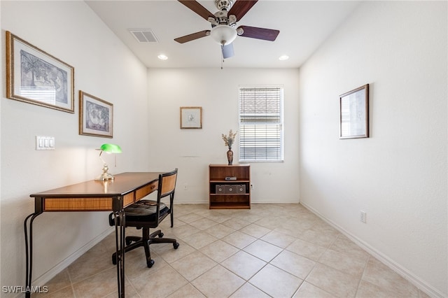 office featuring light tile patterned floors, visible vents, baseboards, and a ceiling fan