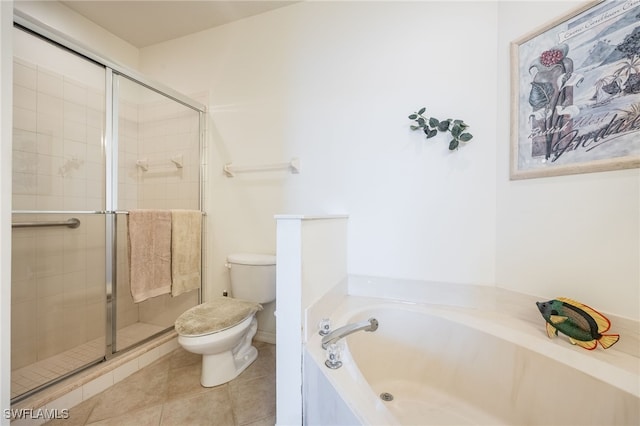 bathroom with toilet, a bath, a stall shower, and tile patterned flooring