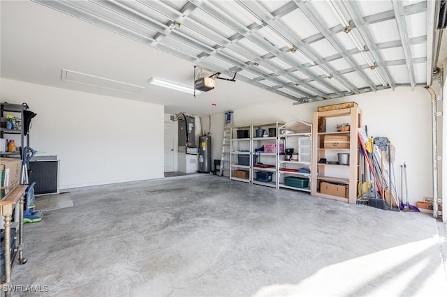 garage featuring a garage door opener and electric water heater