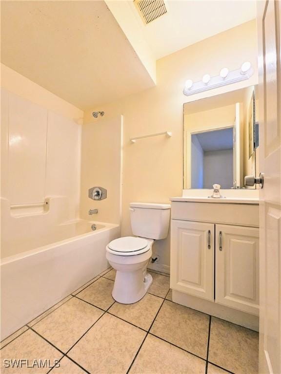 full bath featuring tile patterned flooring, visible vents, shower / washtub combination, toilet, and vanity