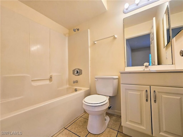 full bath with vanity, baseboards, tub / shower combination, tile patterned flooring, and toilet