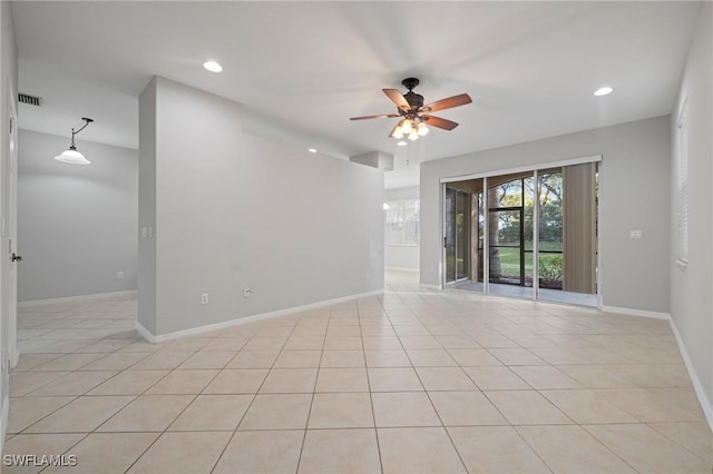 unfurnished room with light tile patterned flooring, recessed lighting, baseboards, and a ceiling fan