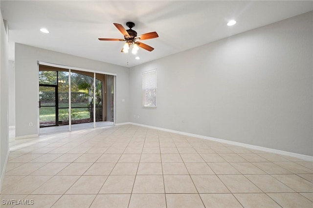 empty room with recessed lighting, baseboards, and a ceiling fan