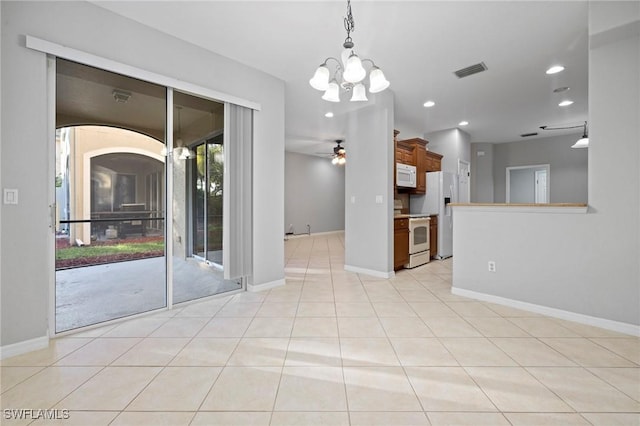 unfurnished room with light tile patterned floors, visible vents, baseboards, recessed lighting, and ceiling fan with notable chandelier