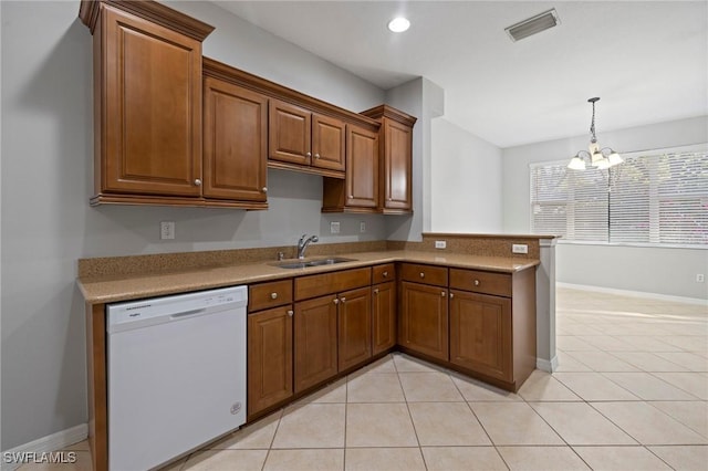 kitchen featuring visible vents, a sink, dishwasher, a notable chandelier, and brown cabinets